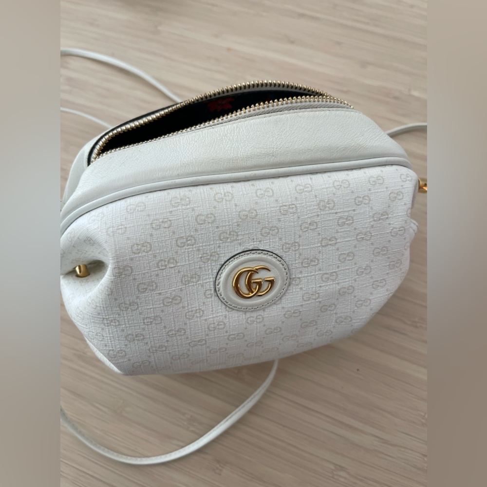 GUCCI
White GG Coated Canvas Candy Crossbody Bag